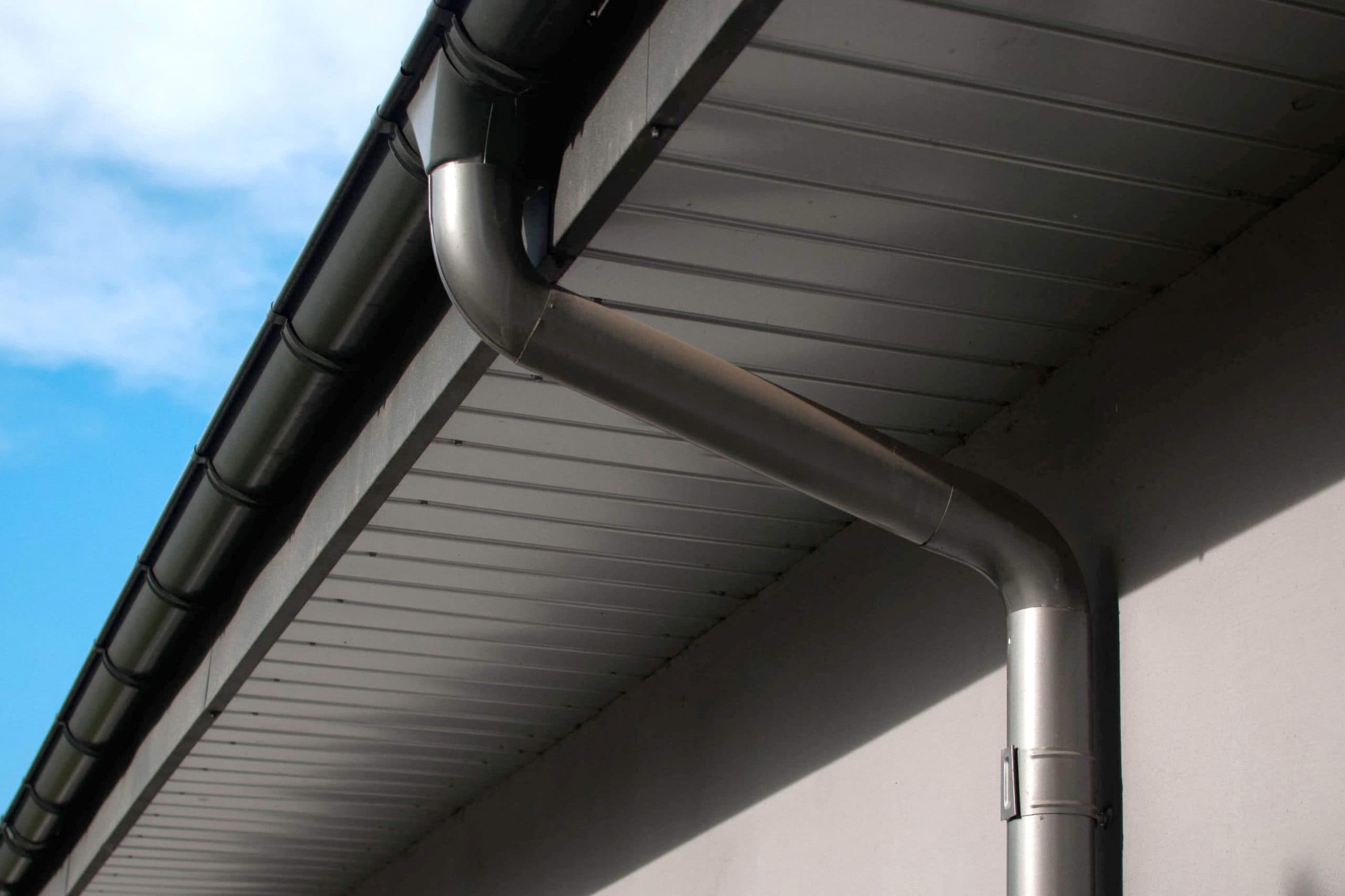 Corrosion-resistant galvanized gutters installed on a commercial building in Douglasville